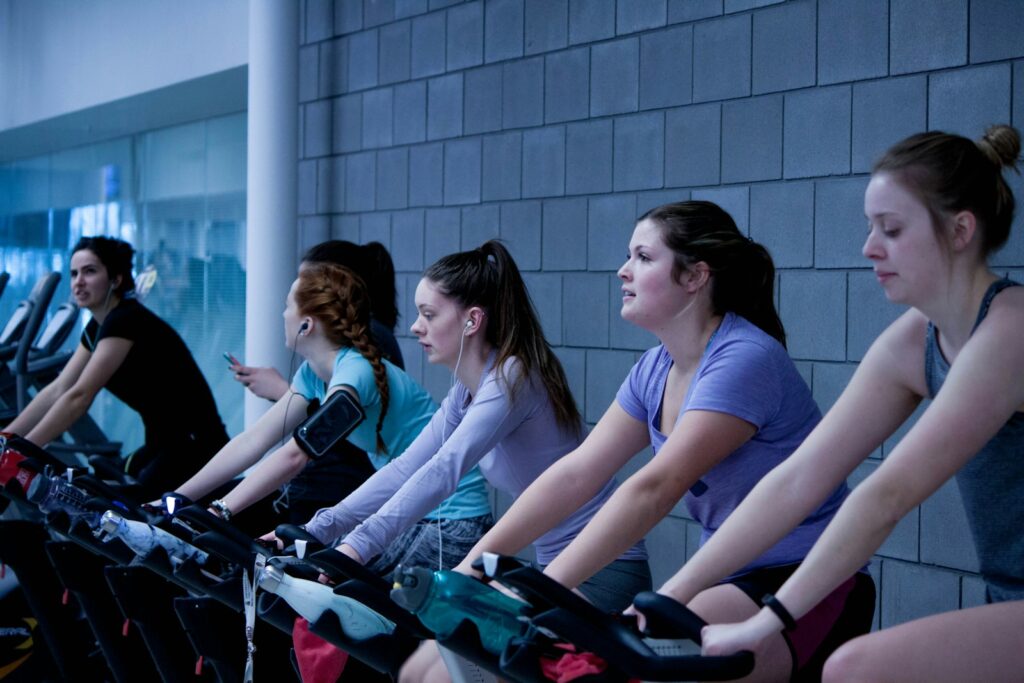 women taking a spin class at equinox